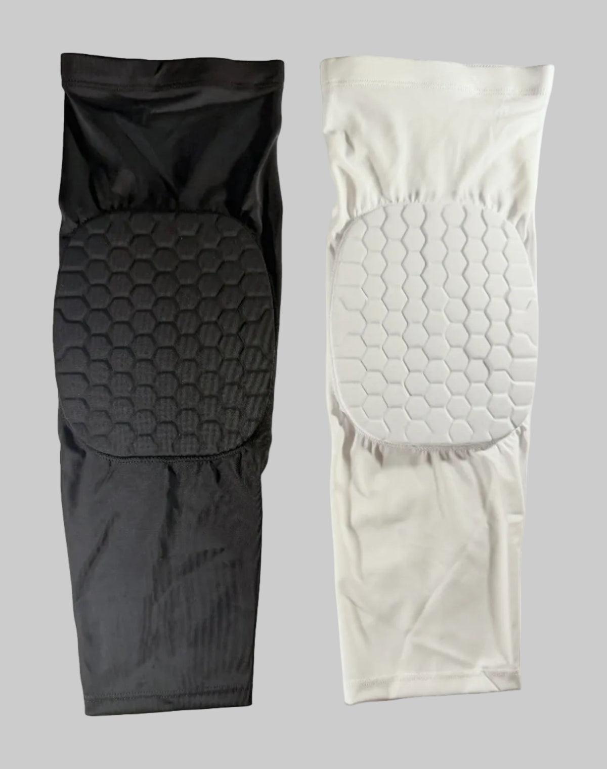 Black and white FlexCell sliding knee sleeves side by side